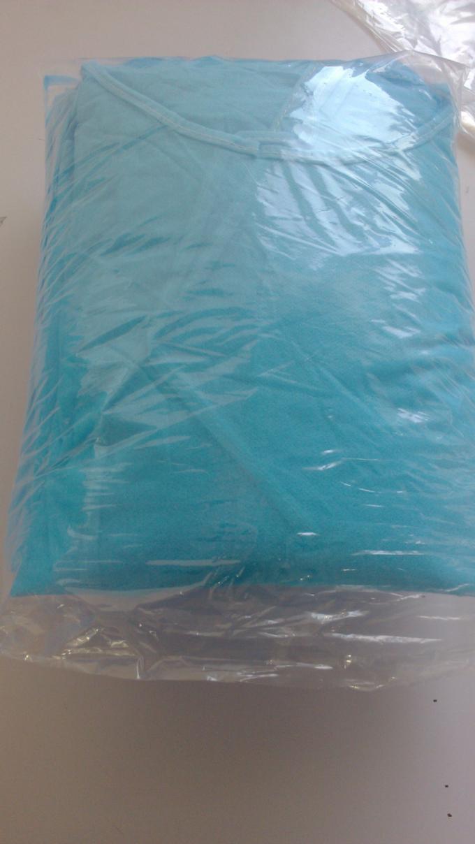 Elástico/hizo punto el vestido médico de las batas disponibles de la seguridad del puño con el cuello y los bolsillos de V